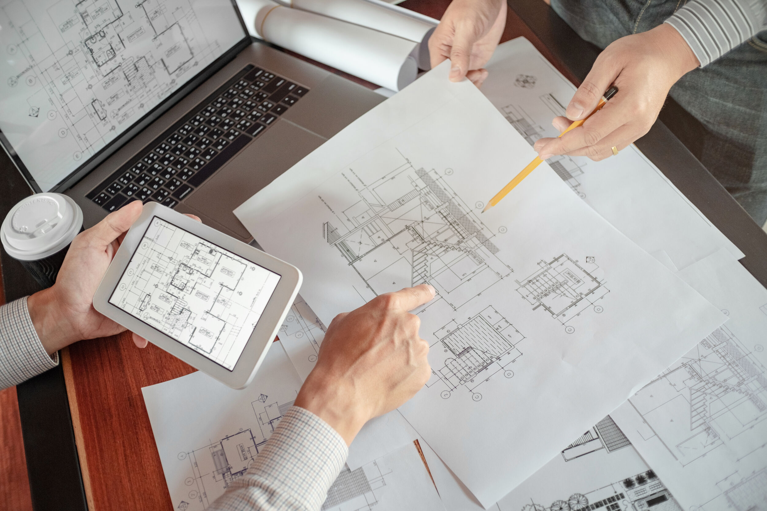 Interior architecture discussing with blueprint, Engineering Concept.