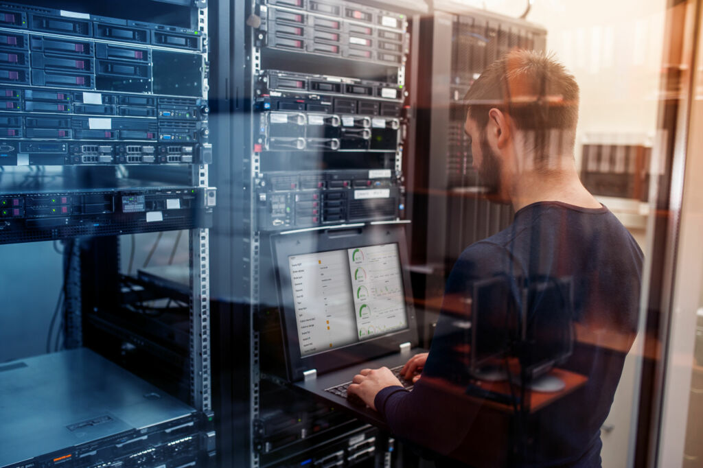 network engineer working in server room