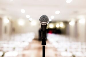 Close up old microphone in conference room. Business and company concept
