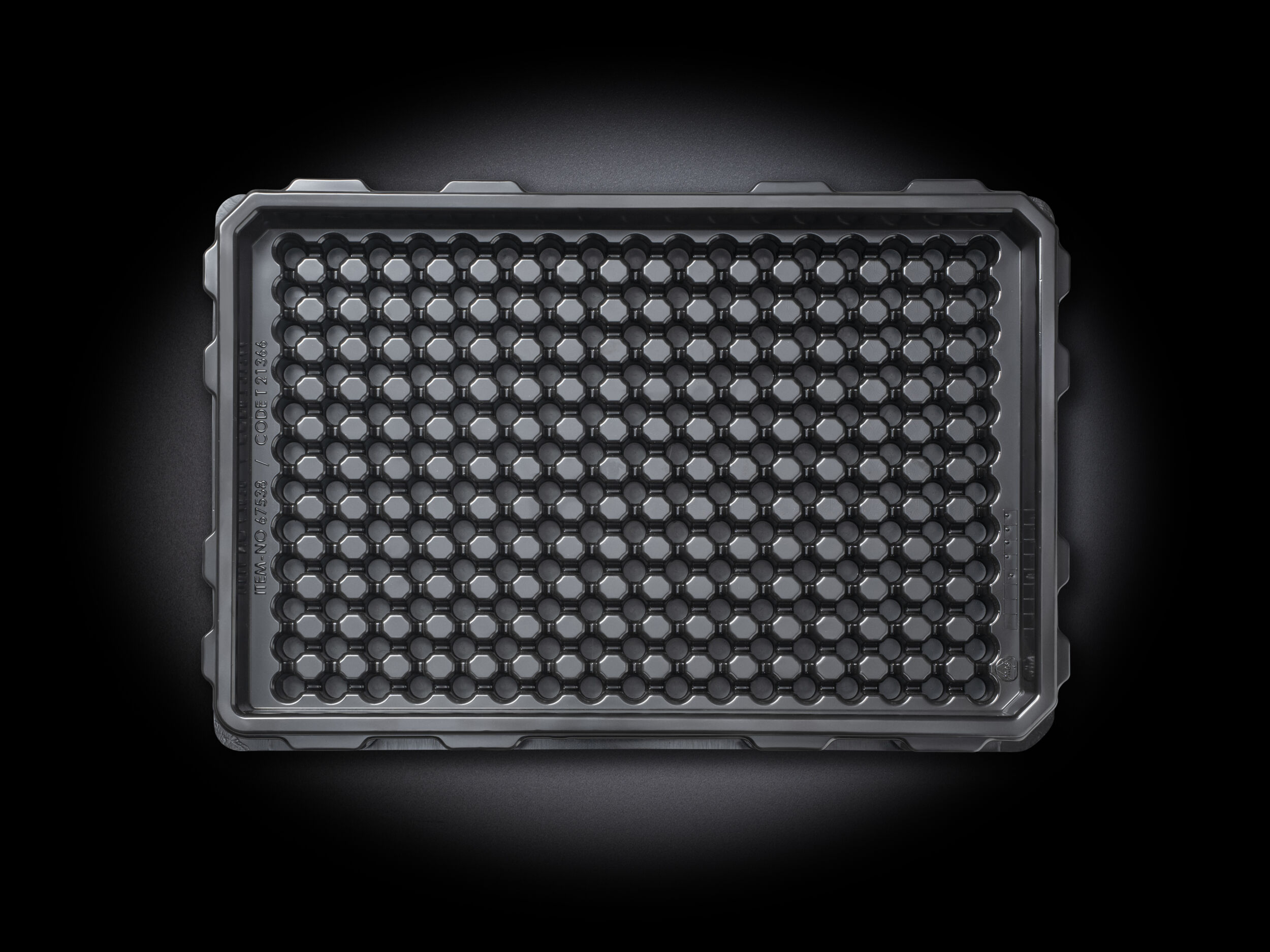 Schwarzes Automatisierungs-Tray mit runden Nestern