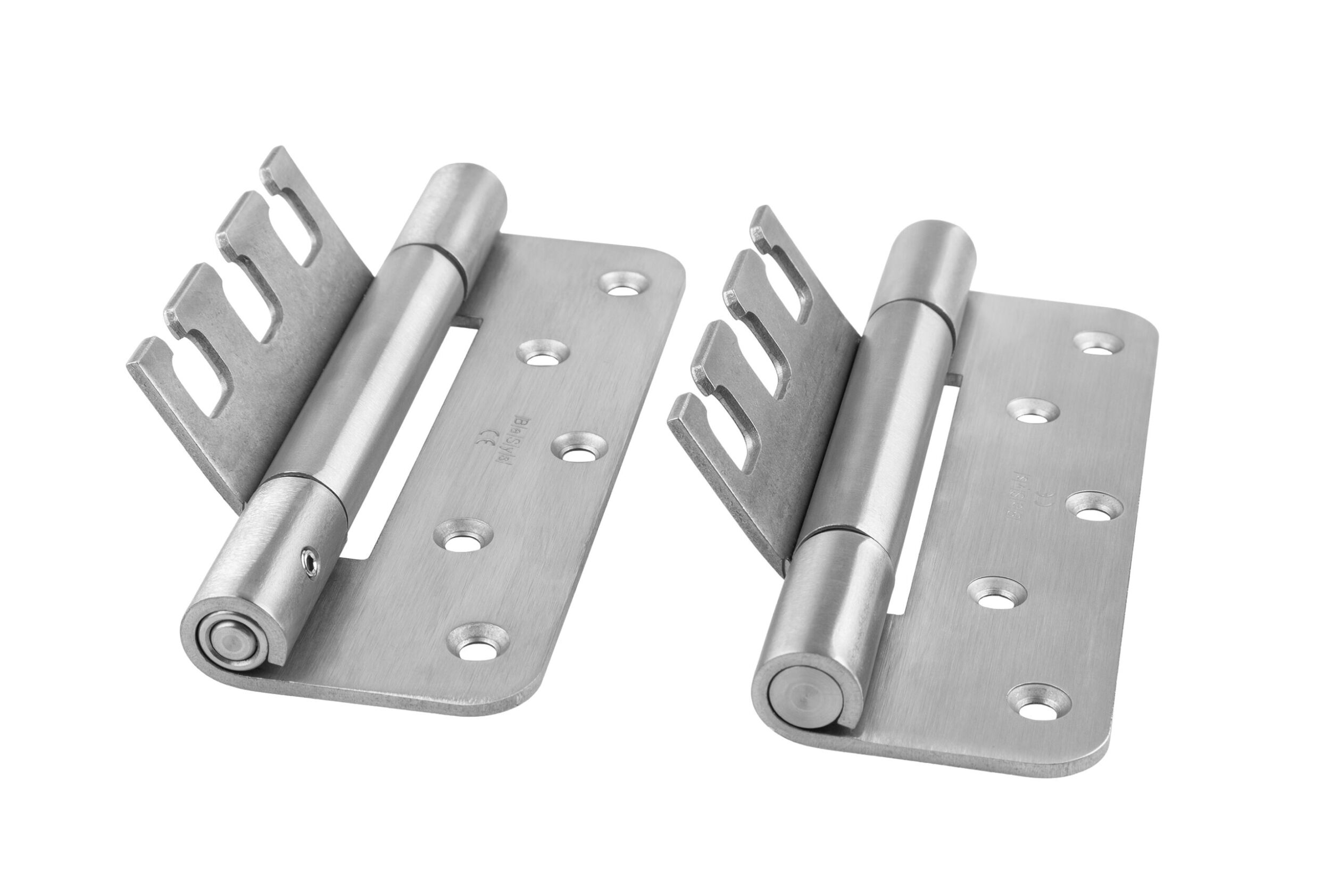 Das Objekttürband-System mit 18mm Rollendurchmesser hat ein neues Konstruktionsprinzip: Links der Vorgänger mit durchgehender Achse und Stiftsicherung, rechts das neue Modell.