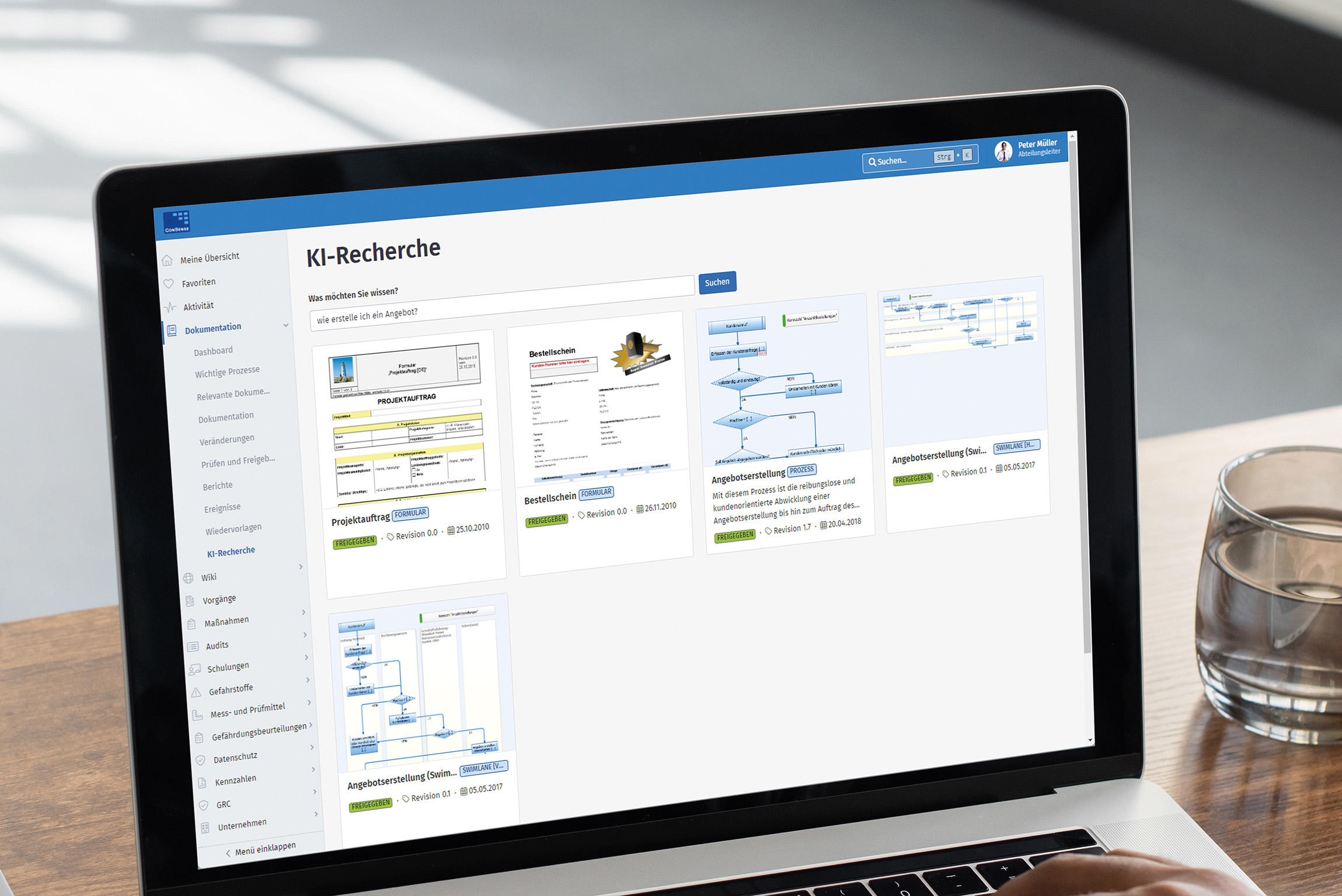 Young man using laptop computer with blank empty mockup screen