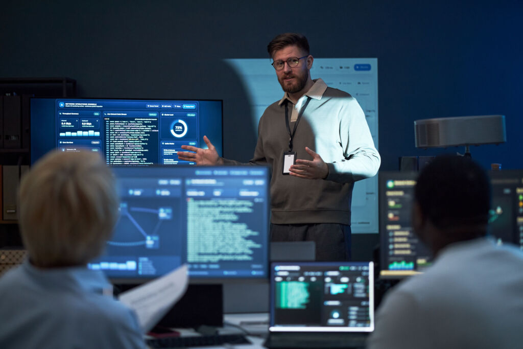 Adult Man Presenting Cybersecurity Strategy to it Team
