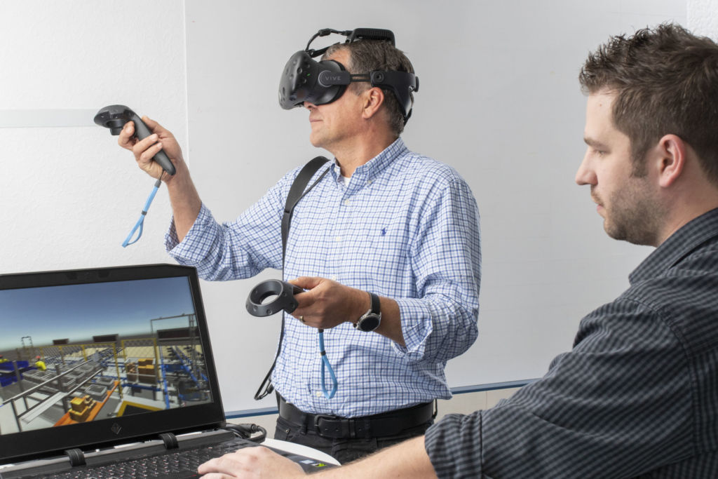 Das Virtual-Reality-Modell ermöglicht es, den geplanten Lageraufbau
für den Kunden via VR-Brille erlebbar zu machen.