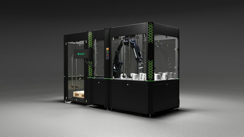 Automatisierungshürde senken 1 Die schlüsselfertige Schleiflösung von Unchained Robotics besteht aus einem Modul mit Yaskawa-Roboter und einem oder mehreren Schleifstationsmodulen.