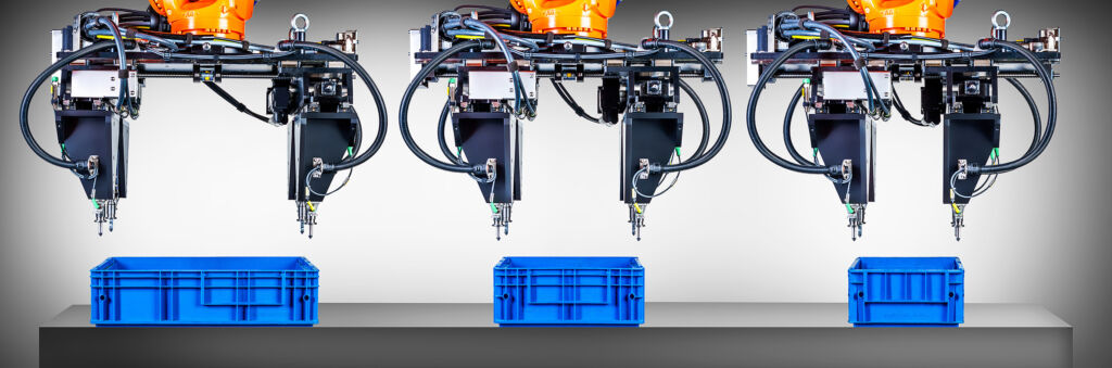 Vision-Lösung für variables Kisten-Picking im Sekundentakt 2 Das 3D-Messsystem ermittelt die jeweilige Kistengröße - der Multifunktionsgreifer passt sich automatisch an.