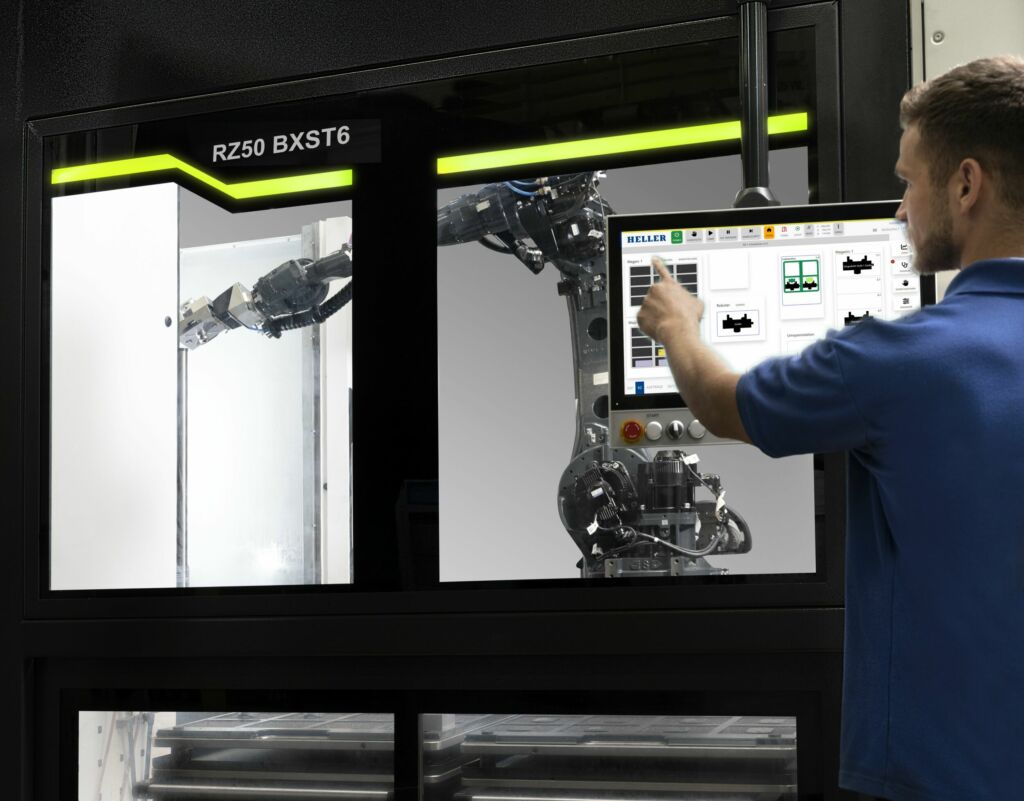 Beschickung von Heller-Werkzeugmaschinen 1 Die Roboterzelle RZ 50 von Heller ist auf die Serienproduktion mit mittleren und hohen Losgrößen ausgerichtet.