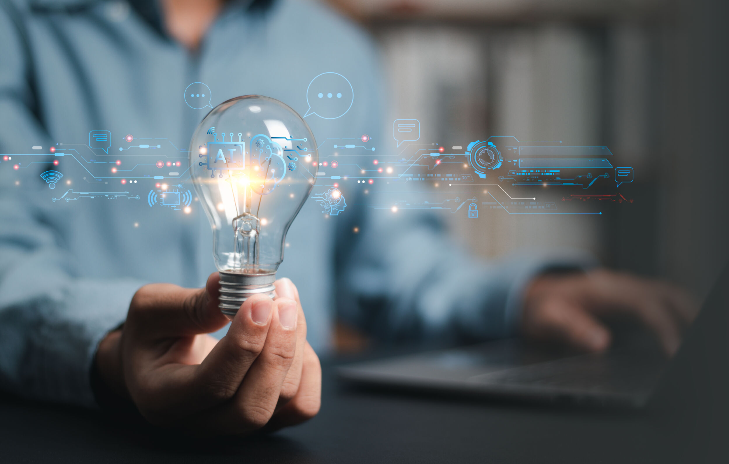 Businessman holding light bulb with Ai brain inside, business networking technology innovation, idea and imagination, creativity and inspiration.