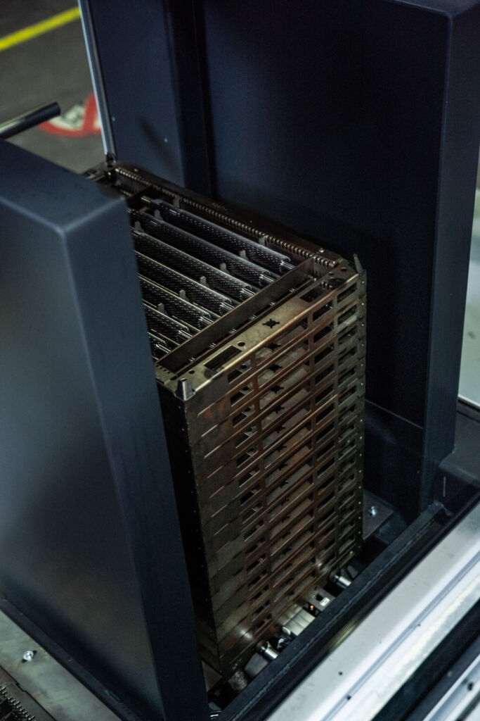 Standard individualisiert 3 Bucht des Palletmasters
mit auf einem Bodenroller gestapelten Werkstückträgern