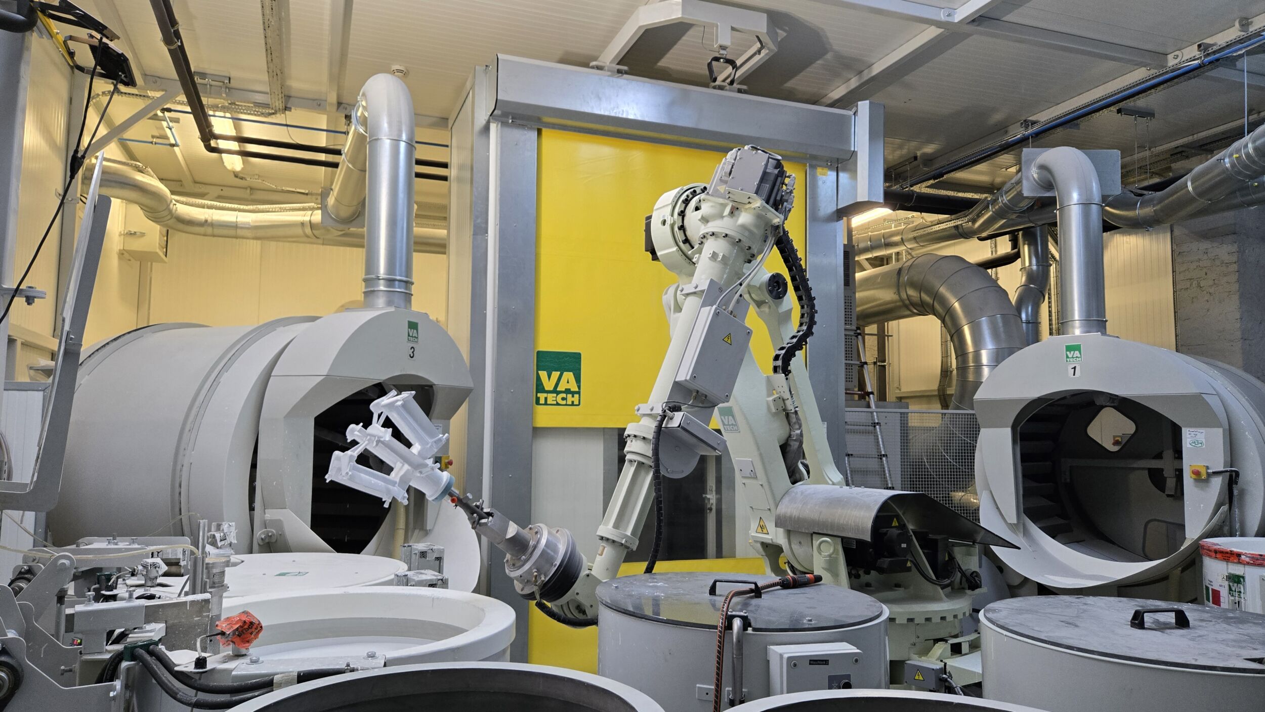 Lücke geschlossen zwischen Industrie und Forschung 3 Schon seit zehn Jahren kommt der Kawasaki-Roboter ZX130L beim Forschungsinstitut Access bei der Entwicklung von Formschalensystemen und Gießtrauben zum Einsatz.