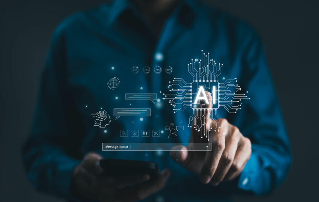 Mit Edge AI Datenschutz und Energieeffizienz verbessern 1 Chat with AI or Artificial Intelligence technology. Man touching chatting virtual with an intelligent artificial intelligence asks for the answers he wants. Smart assistant futuristic Chatbot