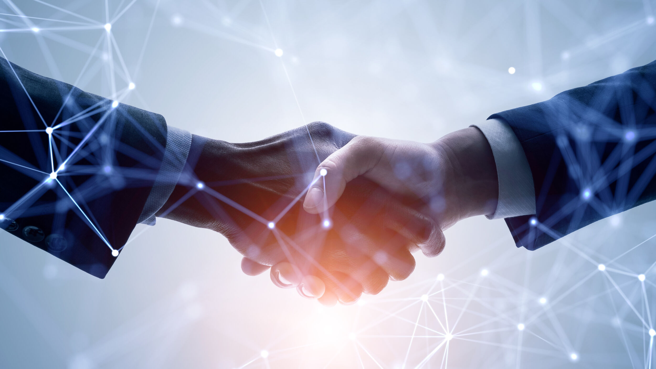 Vinci Energies kündigt Übernahme von All for One an 11 Business network concept. Customer support. Shaking hands