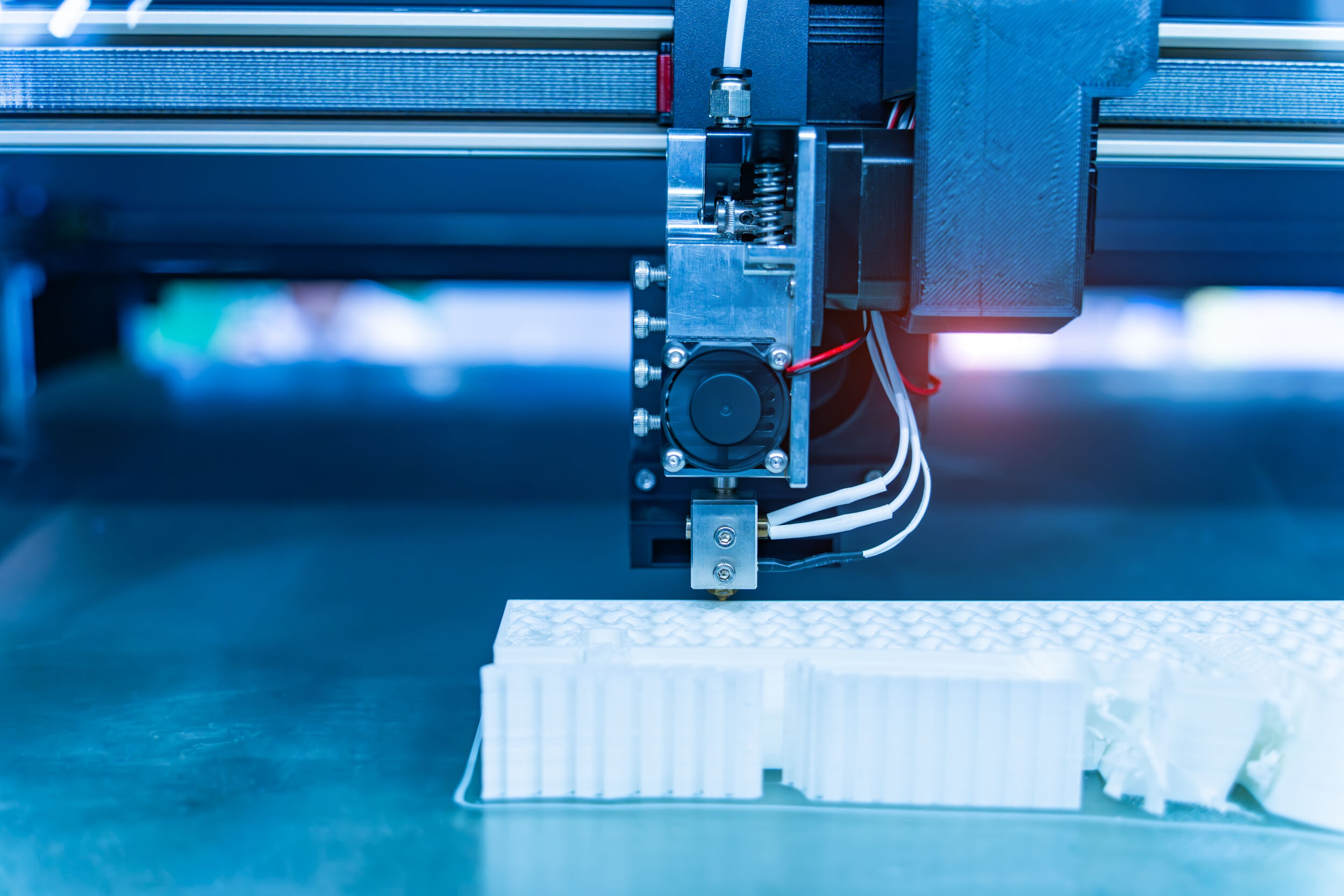 3D printer or additive manufacturing and robotic automation technology