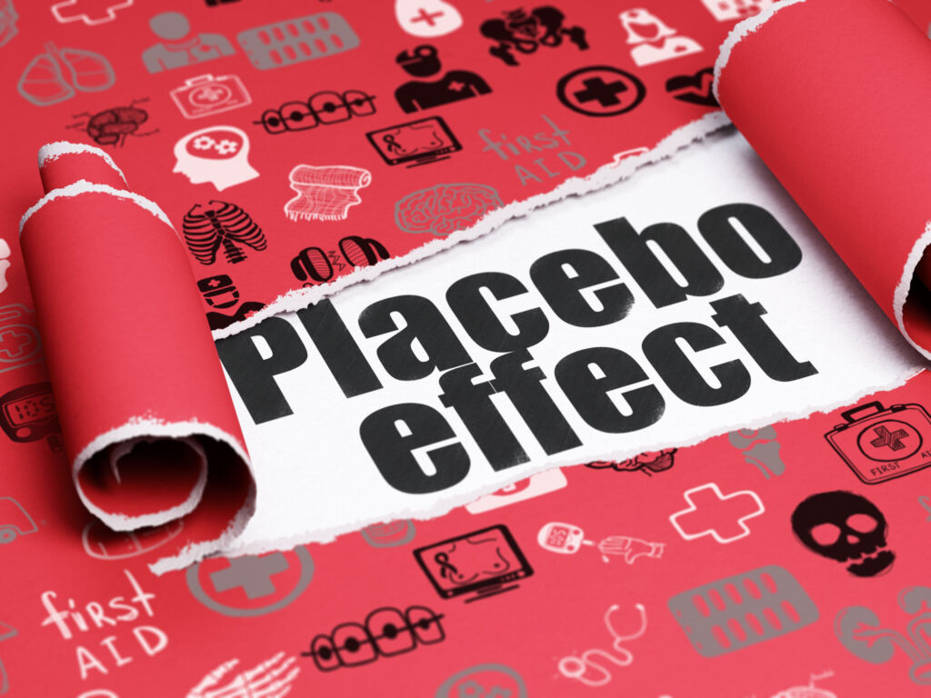 Allein der Glaube an Technologie reicht aus 1 Healthcare concept black text Placebo Effect under the piece of torn paper