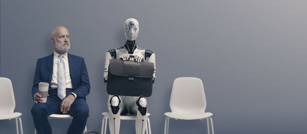 Personalverantwortliche haben Vorbehalte beim KI-Einsatz 1 Man and AI robot waiting for a job interview: AI vs human competition
