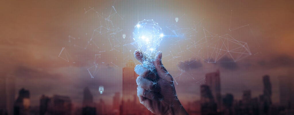 Wie die Deutschen zur Digitalisierung stehen 1 Hand businessman holding light bulb with mesh light line.future