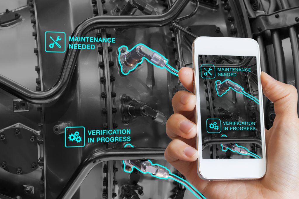 Pre-Collision-Sensor 2 Augmented Reality technology maintenance and service of mechanical parts, technician using smartphone with AR interface on screen in smart industry, automated monitoring process
