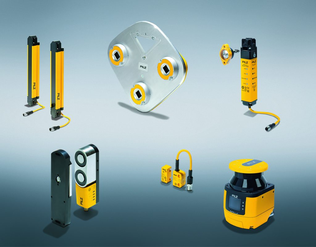 Ohne Barrieren sicher geprüft 1 Pilz bietet komplette Lösungen für die Raum- und Flächenüberwachung – darunter die Lichtgitter PSENopt und der sichere Laserscanner PSENscan (vorne rechts).