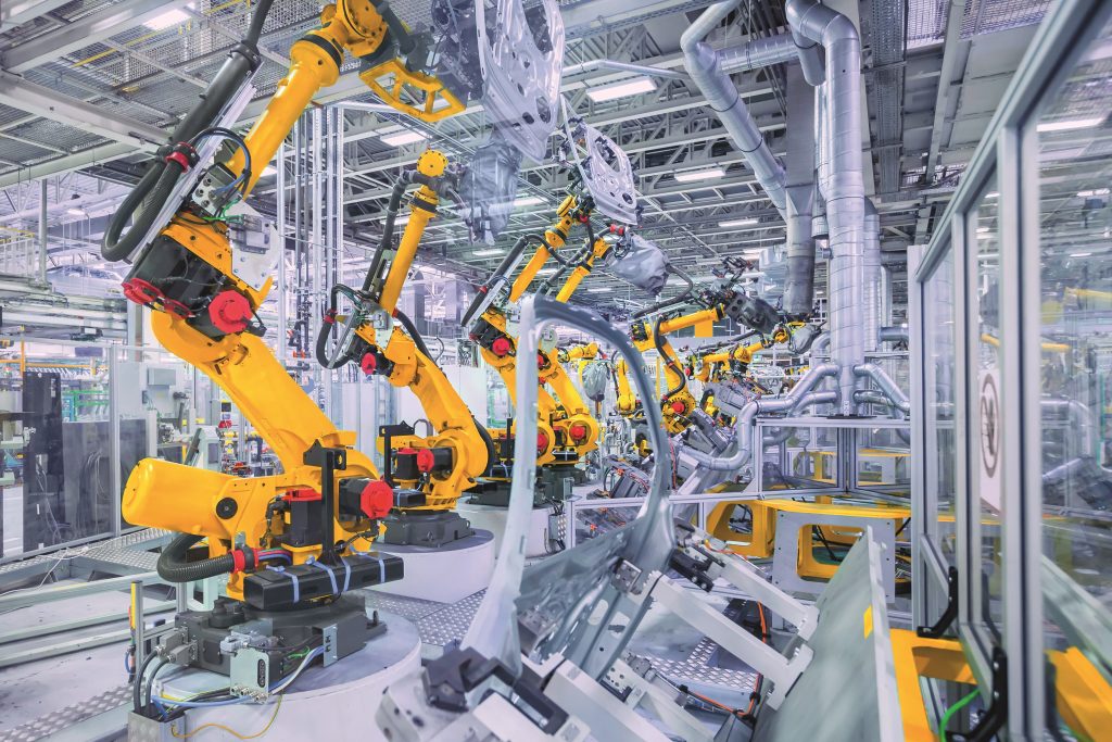 Profinet-Leitungen
an Robotern 2 robots in a car plant