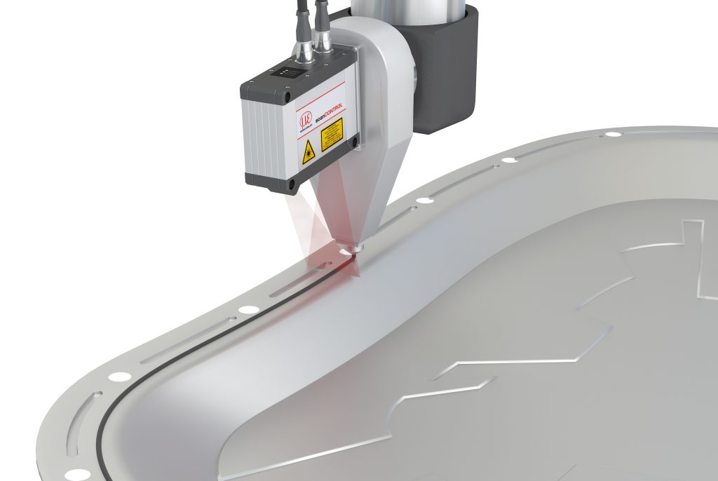 Absolute Präzision 2 Nach dem Einsetzen der Batteriepakete wird zwischen den Stegen automatisiert eine Wärmeleitpaste aufgebracht, die die Abwärme nach außen führt. Vor dem Auftragen muss das Volumen zwischen den Stegen bis zur Oberfläche der Batteriepakete ermittelt werden.