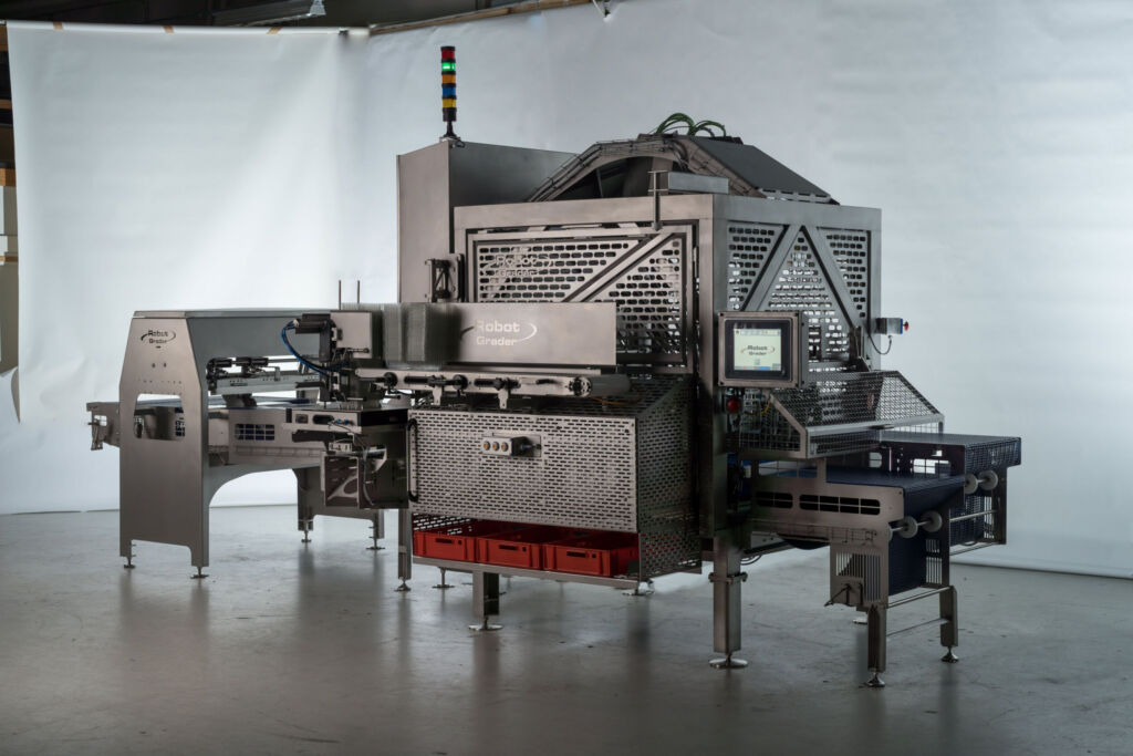All in One 2 Der RobotGrader kann bis zu 320 Einheiten pro Minute entsprechend vorgegebenen
Gewichtskriterien in Schalen oder Behälter platzieren.