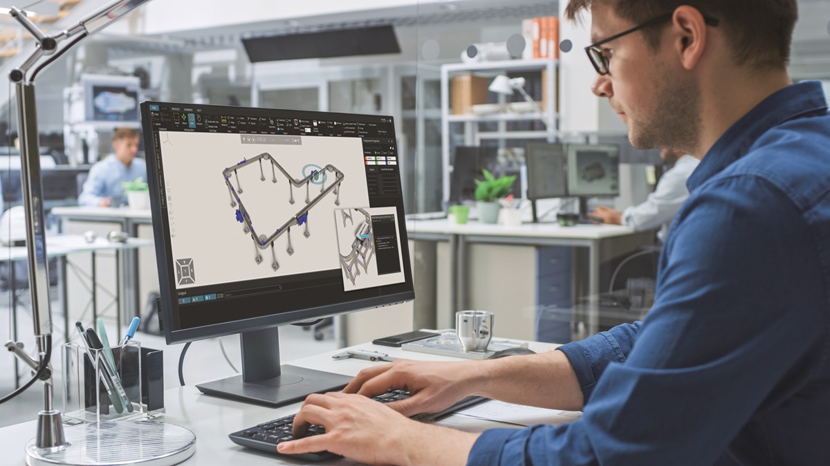Over the Shoulder Shot of Engineer Working with CAD Software on