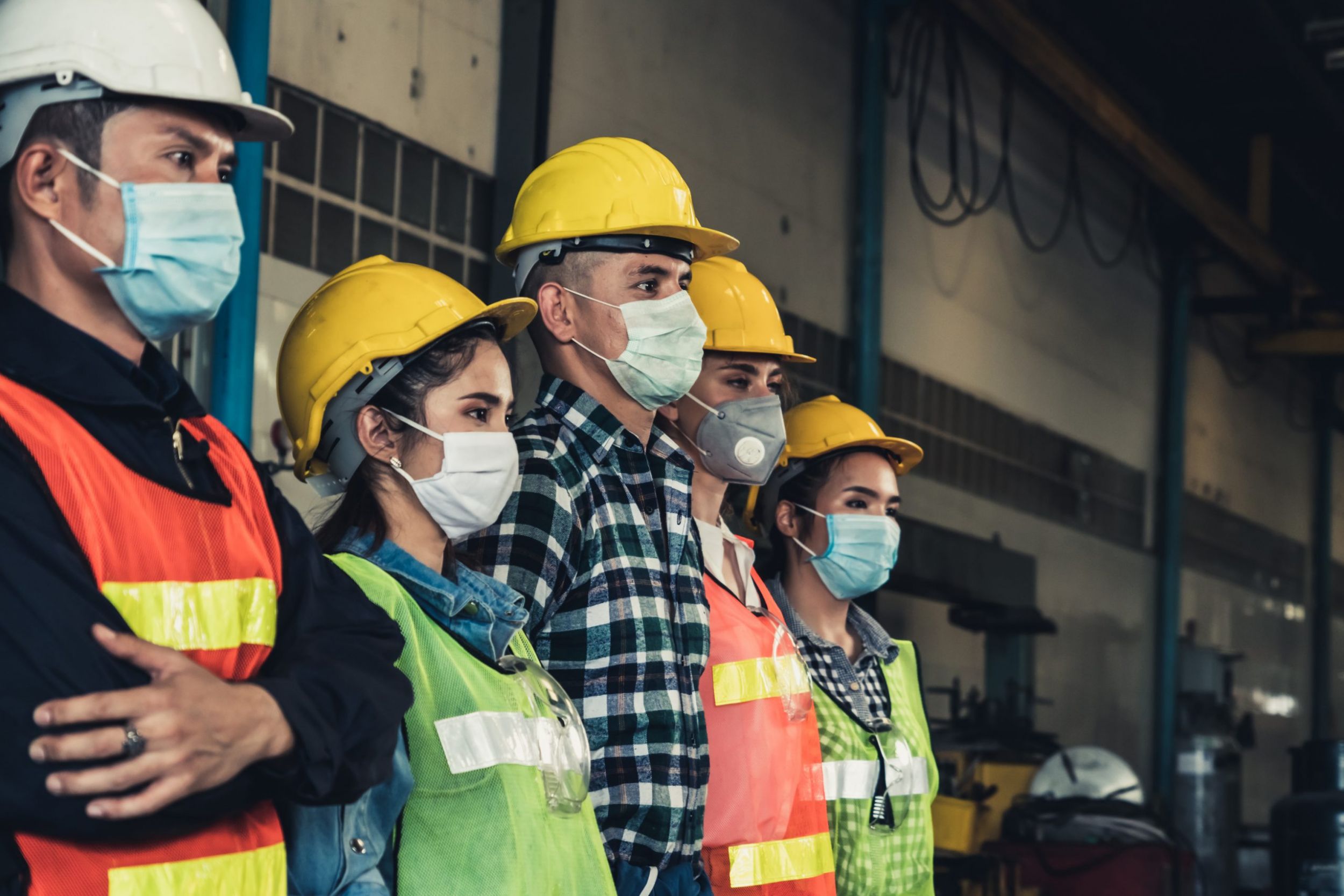 Factory workers with face mask protect from outbreak of Corona V scaled