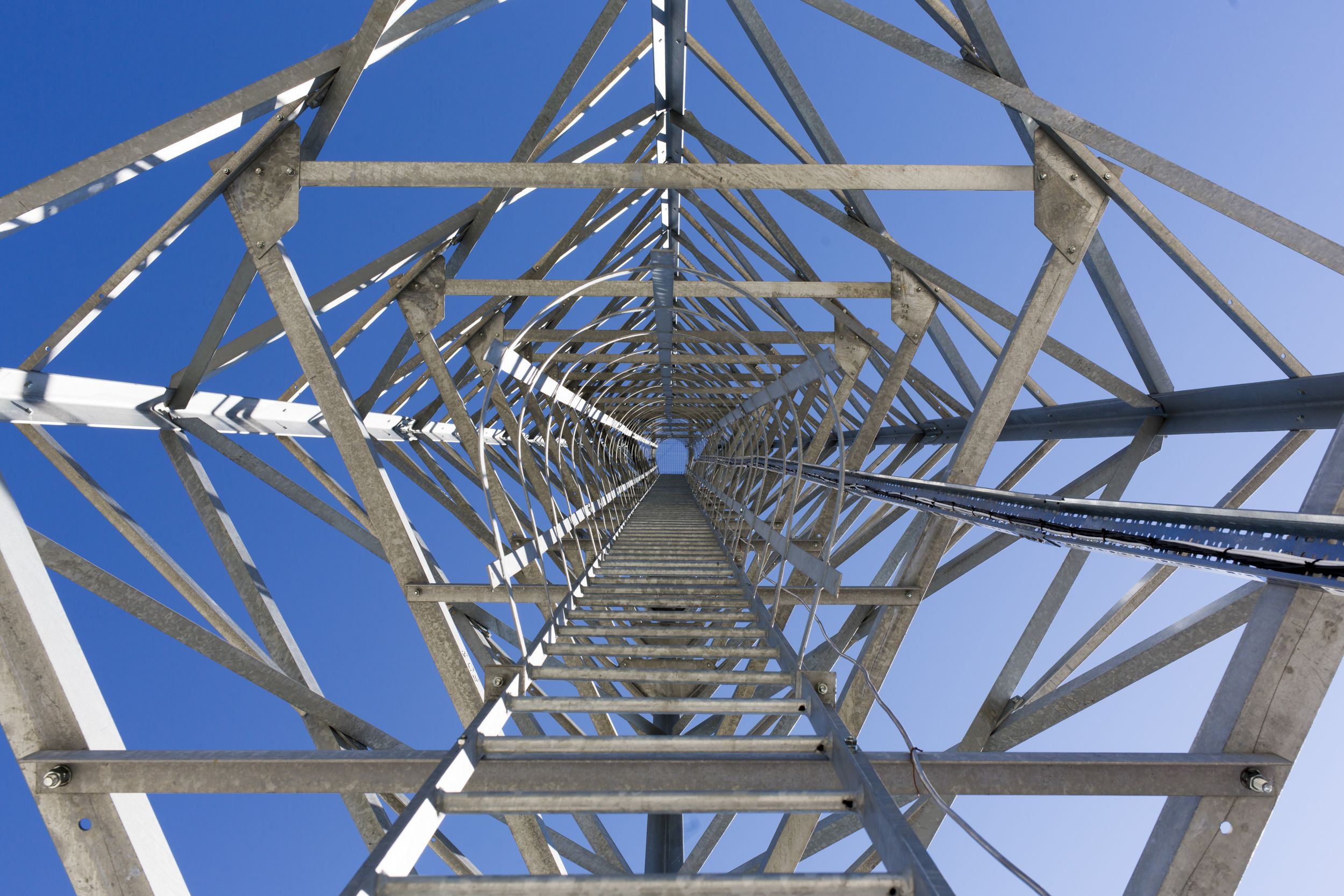 Ladders of a communication tower in the mountain designed to monitor with cameras and notify for fires.