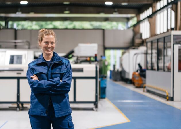 Young woman working as a skilled worker in a high tech company portrait