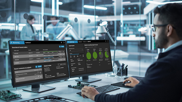 Portrait of a Handsome Hispanic Industrial Engineer Developing 3D Model of a Circuit Motherboard on Computer CAD Software in a Factory. Modern Technological Research and Development Center.; Shutterstock ID 2242349377; purchase_order: -; job: -; client: -